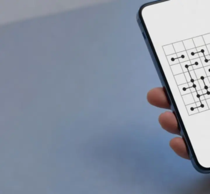 Logic grid puzzle interface showing a clean grid and clue panel